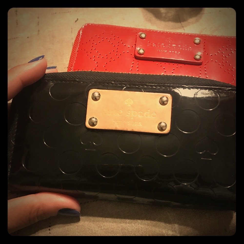 2...Red and. Black Kate Spade wristlets!
